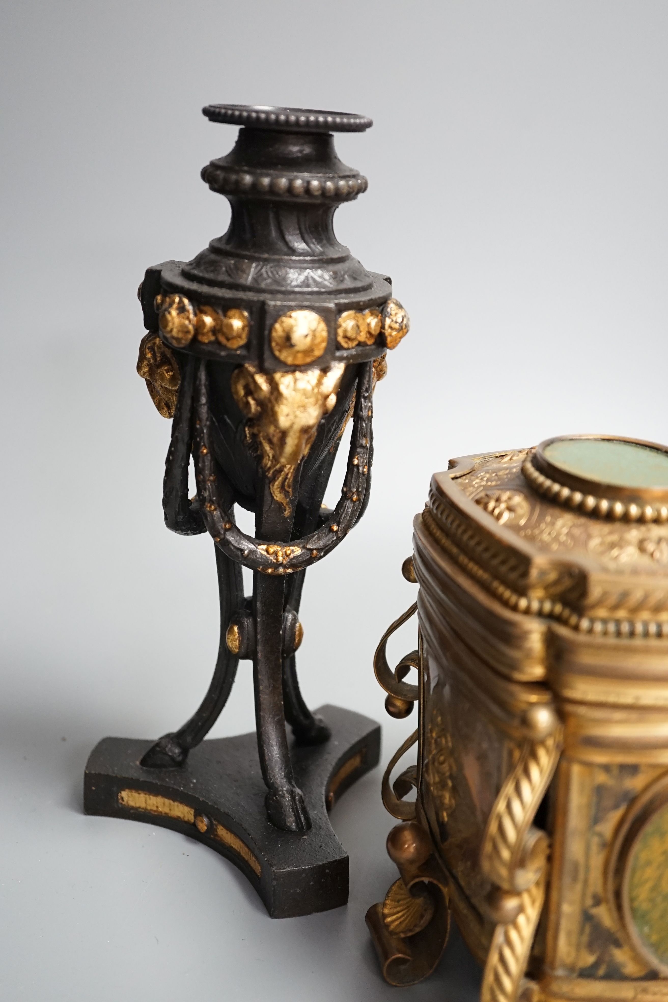 A French gilt metal casket inset with reverse painted glass panels and a pair of ormolu style candlesticks, 22.5cm tall